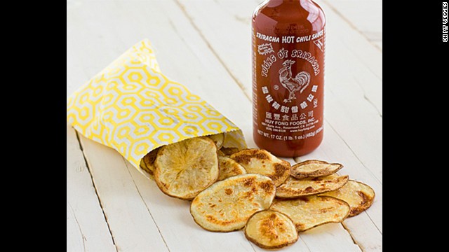Don't forget the chips! Sriracha gives these homemade potato chips a kick. You just need a Russet potato, sriracha, peanut oil and salt. 