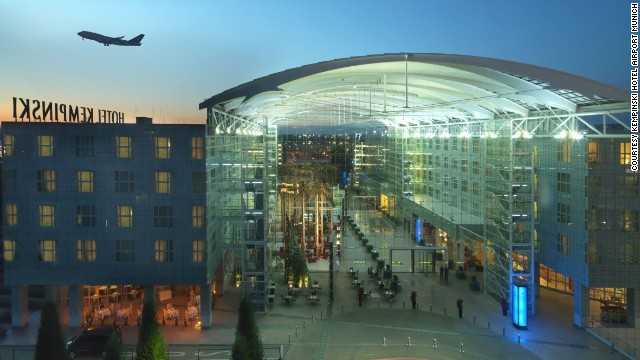 Soundproof windows and blackout curtains help guests disconnect from the busy travel landscape outside at the Kempinski Hotel at the Munich, Germany airport.