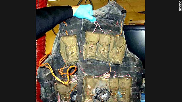 An inert suicide vest was also found. Inert and replica weapons are just as likely to be confiscated as real ones, the TSA says.
