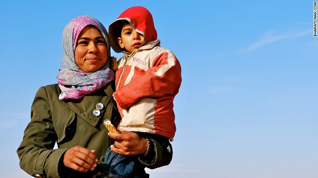 The majority of the refugees walking across the border are women with children. Many of the men have either stayed behind to fight or have been killed during the three-year civil war in Syria.