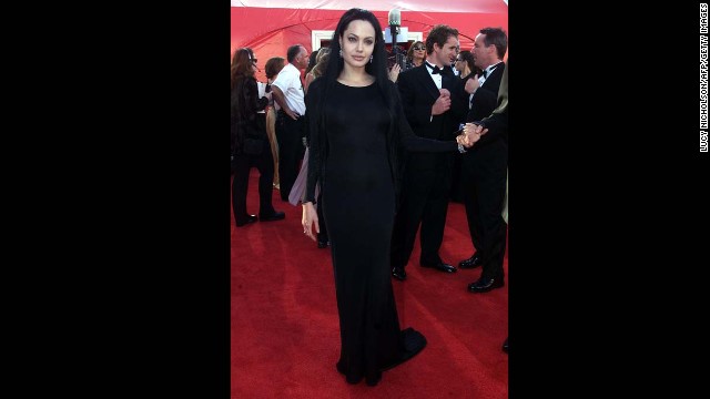 We get it: Angelina Jolie has a personal style. It often involves a lot of black -- and sometimes clingy -- fabrics. But even Morticia Addams would dress it up a bit when going to the Oscars. Especially if she was going to walk away with the best supporting actress award, as Jolie did in 2000.