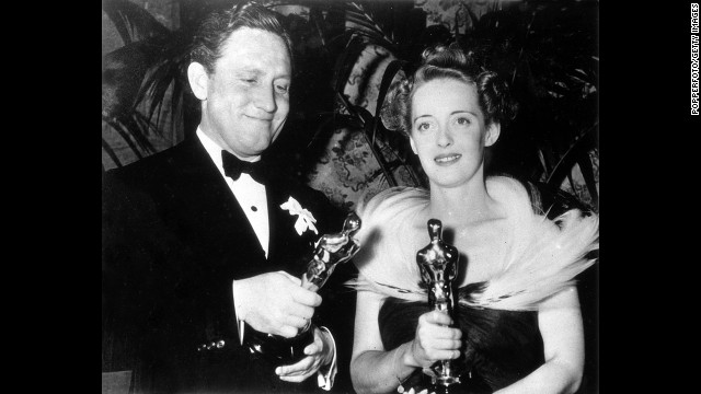 Spencer Tracy takes home his second best actor Oscar for "Boys Town." He appears here with Bette Davis, best actress for "Jezebel," at the ceremony held in 1939.