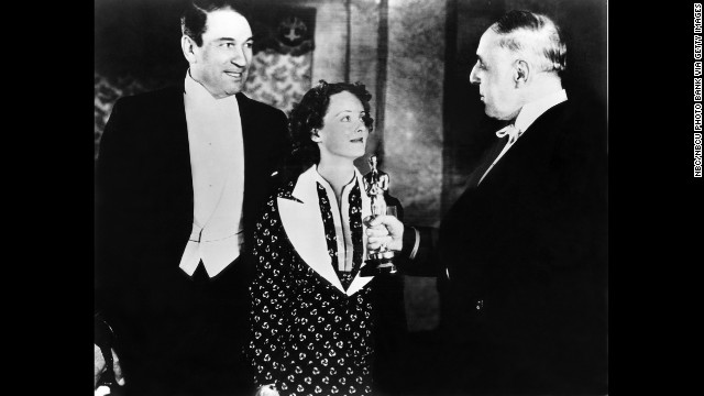 Victor McLaglen, left, beat out two earlier Oscar winners to claim the best actor prize for "The Informer." He was up against Charles Laughton and Clark Gable, both nominated for their roles in best picture winner "Mutiny on the Bounty." McLaglen appears with best actress winner Bette Davis and filmmaker D.W. Griffith of "The Birth of a Nation" fame at the March 1936 ceremony. 