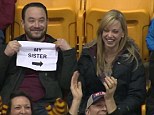 University of Minnesota alumnus Adam Martin took his sister Maria to a game on Valentine's Day and warned her they could be caught on kiss cam