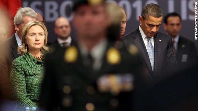 U.S. President Barack Obama and Clinton observe a moment of silence before a NATO meeting November 19, 2010, in Lisbon, Portugal.