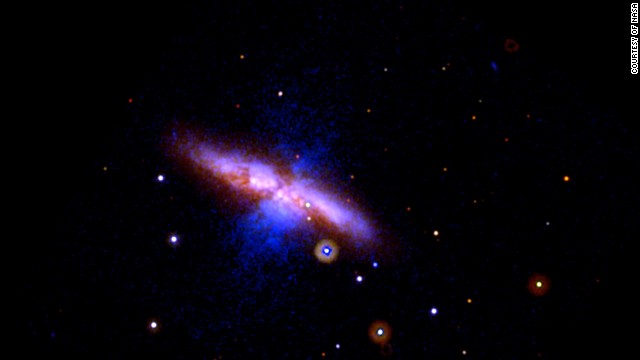 An exploding star, or supernova, was spotted on January 21 in Messier 82, one of the nearest big galaxies. This wide view image was taken on January 22. 