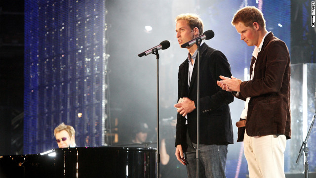 Prince William and Prince Harry speak on stage with Sir Elton John, far left, during a concert they put on to celebrate Princess Diana on July 1, 2007. The event fell on what would have been their mother's 46th birthday and marked 10 years since her death.