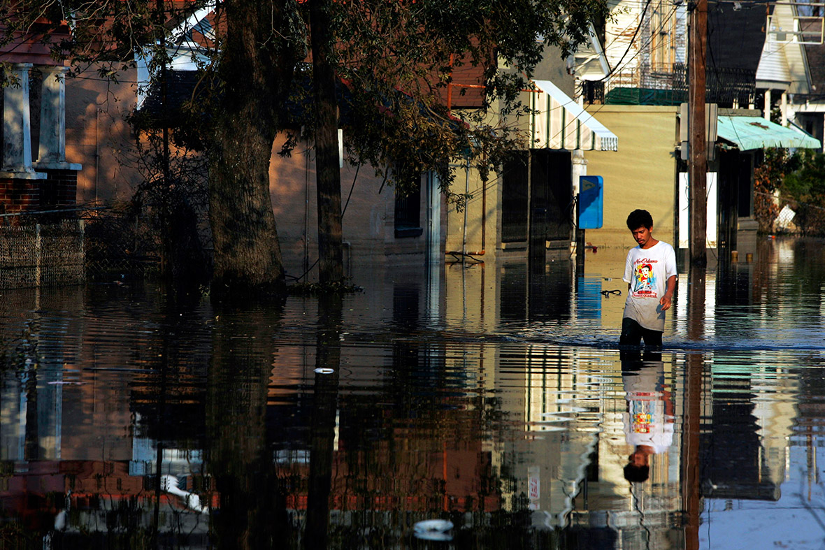 September 4, 2005: A man wades through the Ninth Ward neighbourhood in New Orleans a week after Hurricane Katrina dealt the city a devastating blow