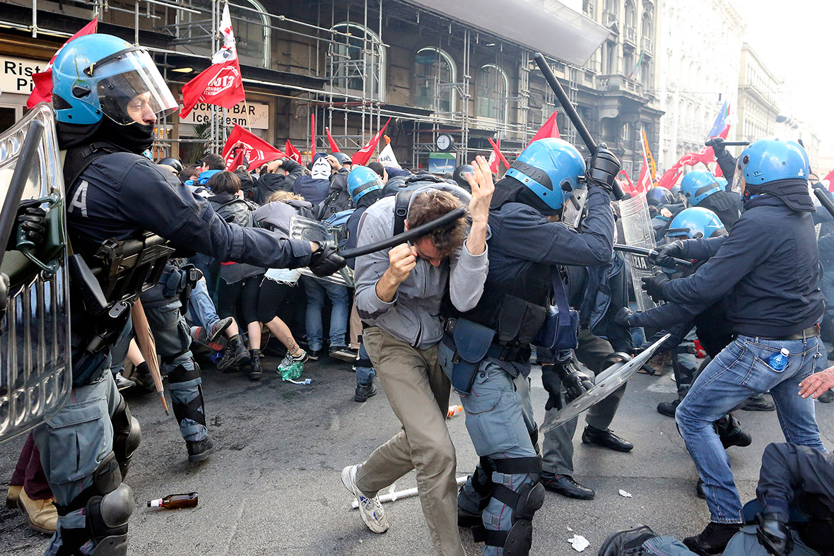 Demonstrators clash with police during a protest against austerity measures in Rome