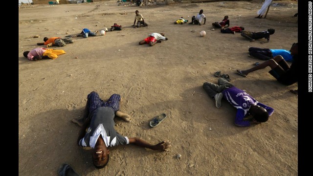 Displaced children from South Sudan gather to play soccer at a camp in Khartoum, Sudan, on Wednesday, March 12.