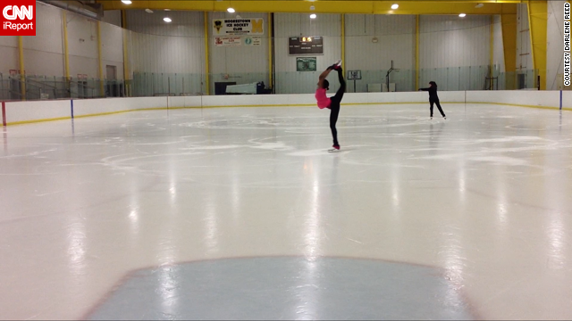 Reed, center, has been working on her skating skills, such as this Biellmann spin.