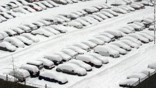 Snow covers cars in Brooklyn on February 13.