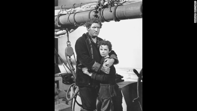 Spencer Tracy, left, with co-star Freddie Bartholomew, won his first best actor Oscar as a Portuguese fisherman in "Captains Courageous." He beat out Oscar-winning actors Fredric March in "A Star Is Born" and Paul Muni in "The Life of Emile Zola." It was Tracy's second nomination. 