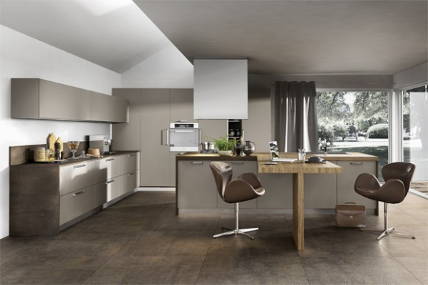 Shades across the brown spectrum may not be the first thing that pops into your head when you imagine a trendy kitchen space, but this design has sandwiched a few together to great effect. The T shaped kitchen island is a really nice touch too if you have that kind of floor space.