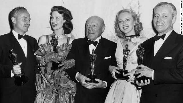 Ronald Colman, far right, a star since the silent days, picked up the best actor Oscar as a jealous actor in "A Double Life." Coleman appears with the year's other winners at the 1948 ceremony -- from left, Darryl Zanuck, producer of best picture "Gentleman's Agreement," best actress Loretta Young, best supporting actor Edmund Gwenn and best supporting actress Celeste Holm.