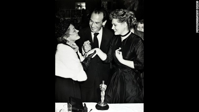 Puerto Rican-born José Ferrer became the first Hispanic to win an Oscar when he was named best actor for "Cyrano de Bergerac." Here he appears with Gloria Swanson, left, and Judy Holliday (best actress for "Born Yesterday") in 1951.