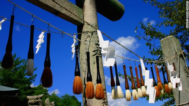 As part of Kumano, Japan's annual Brush Festival, a row of 10,000 brushes hangs along the 99-step path leading to the 10th-century Sakakiyama Shrine. Kumano has been renowned for its brush-making artisans since the end of Japan's Edo period. 
