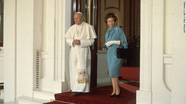 Pope John Paul II walks with the Queen at London's Buckingham Palace in May 1982. 