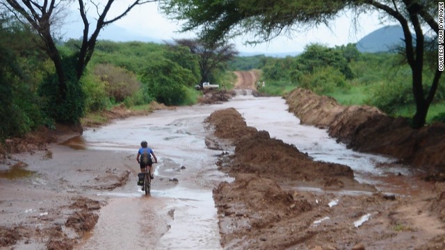 Desert heat isn't the only climatic challenge. Roads become mud baths during Tanzania's rainy season.(Pictured, 2013 Tour)