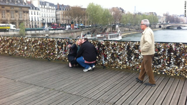 Couples often head to Paris's Pont des Arts bridge to attach padlocks as a symbol of their love.