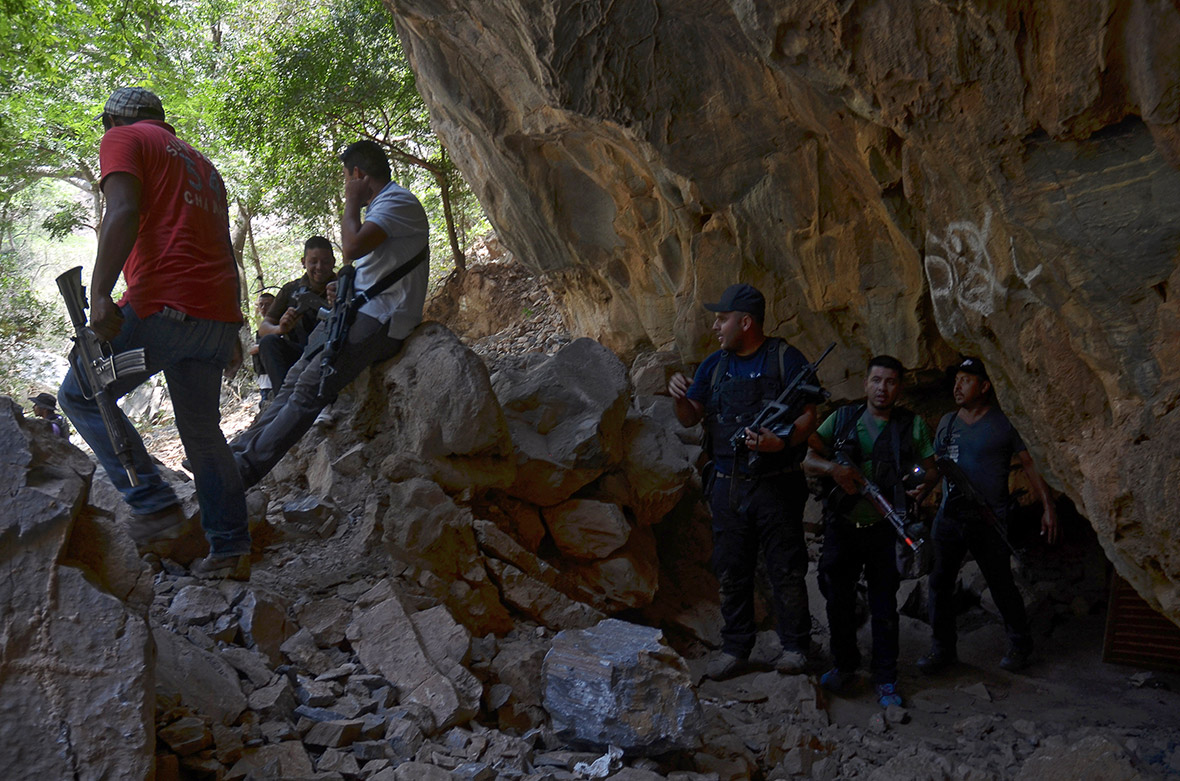 Vigilantes gather outside cave on outskirts of Arteaga in search for Servando Gomez, also known as 