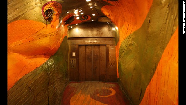 The red dragon painted on the interior of this elevator in the Long Island City Business Center building has 3-D beasts bursting from its eye sockets.