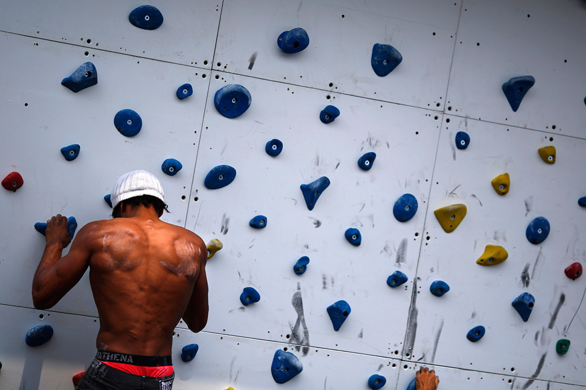 A competitor trains for the Climbing Wall competition during the World Extreme Games in Shanghai