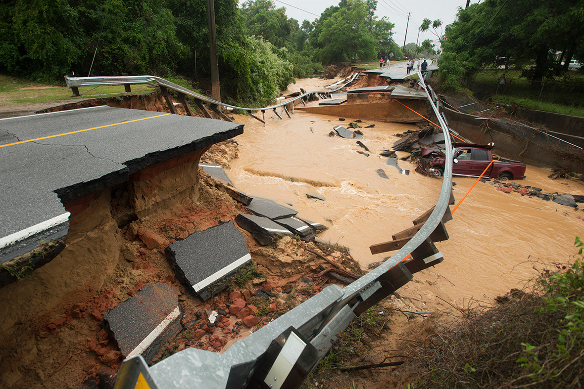 Damage due to flash flooding is seen along Johnson Avenue in Pensacola, Florida, US