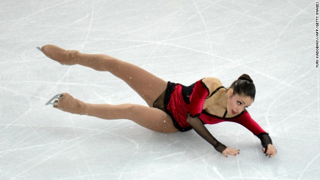 Italy's Stefania Berton falls as she performs with Italy's Ondrej Hotarek during pairs figure skating on February 12.