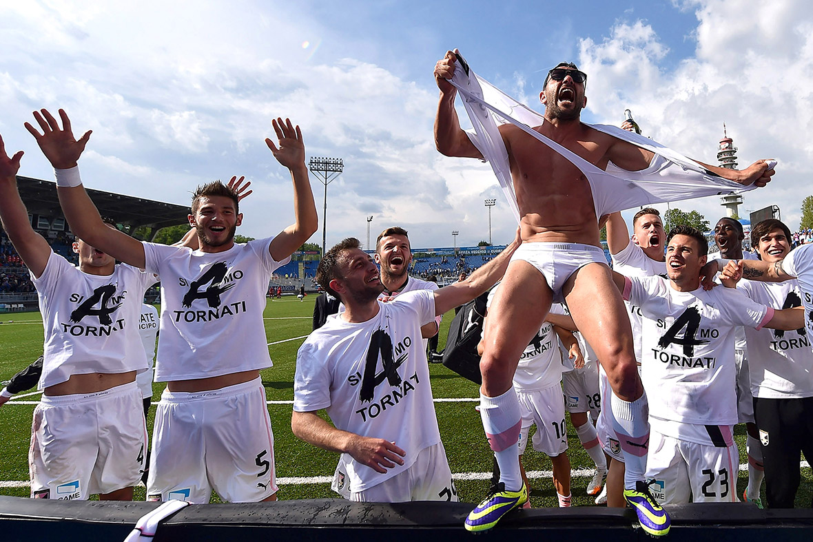 Palermo players celebrate after winning Serie B and gaining promotion to Serie A after their match aginst Novara Calcio in Novara, Italy.