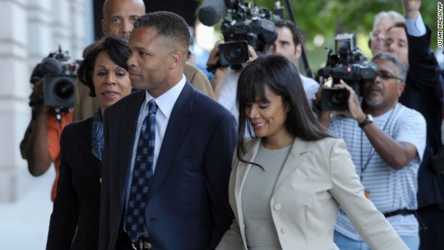 Former U.S. Rep. Jesse Jackson Jr., D-Illinois, and his wife, Sandra, arrive at federal court in Washington on August 14, 2013, for sentencing. Jackson was sentenced to 30 months in prison for improper use of campaign funds, while his wife got 12 months for filing false tax returns.
