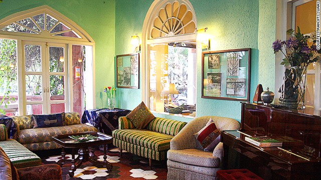 The main lounge at Ranjit's Svaasa, a 200-year-old heritage hotel in Amritsar, is decorated with antique pieces and art from the family's personal collection. 