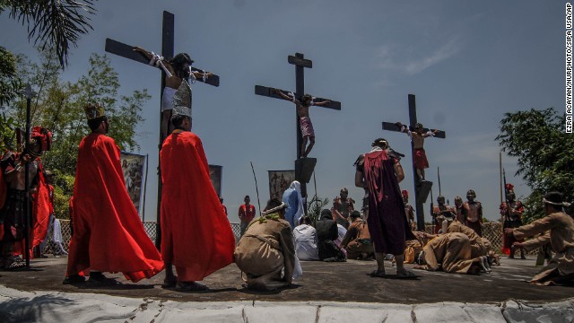 Penitents in San Fernando, Philippines, hang from wooden crosses on Good Friday, April 18, as they take part in a re-enactment of Jesus Christ's crucifixion. Click through the gallery to see how Christians around the world are observing Holy Week, which marks the last week of Lent and the beginning of Easter celebrations.