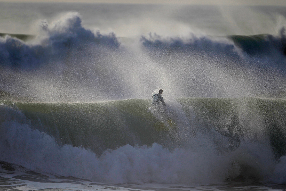 A bodyboarder rides a wave during Sumol Nazare Special Edition in Nazare, Portugal