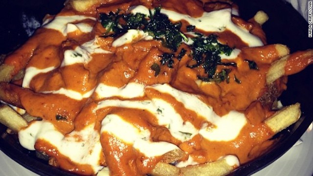 This butter chicken poutine was served at a pub in Canada's Fairmont Chateau Lake Louise hotel. The photographer reports: "Looks so wrong, tastes so right."