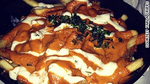 What do you get when you cross Indian tradition with a hungry Canadian? Butter chicken poutine!