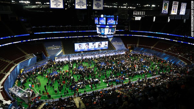 People attend Super Bowl XLVIII media day at the Prudential Center in Newark, New Jersey, on Tuesday, January 28. The Seattle Seahawks and the Denver Broncos will face off on February 2.