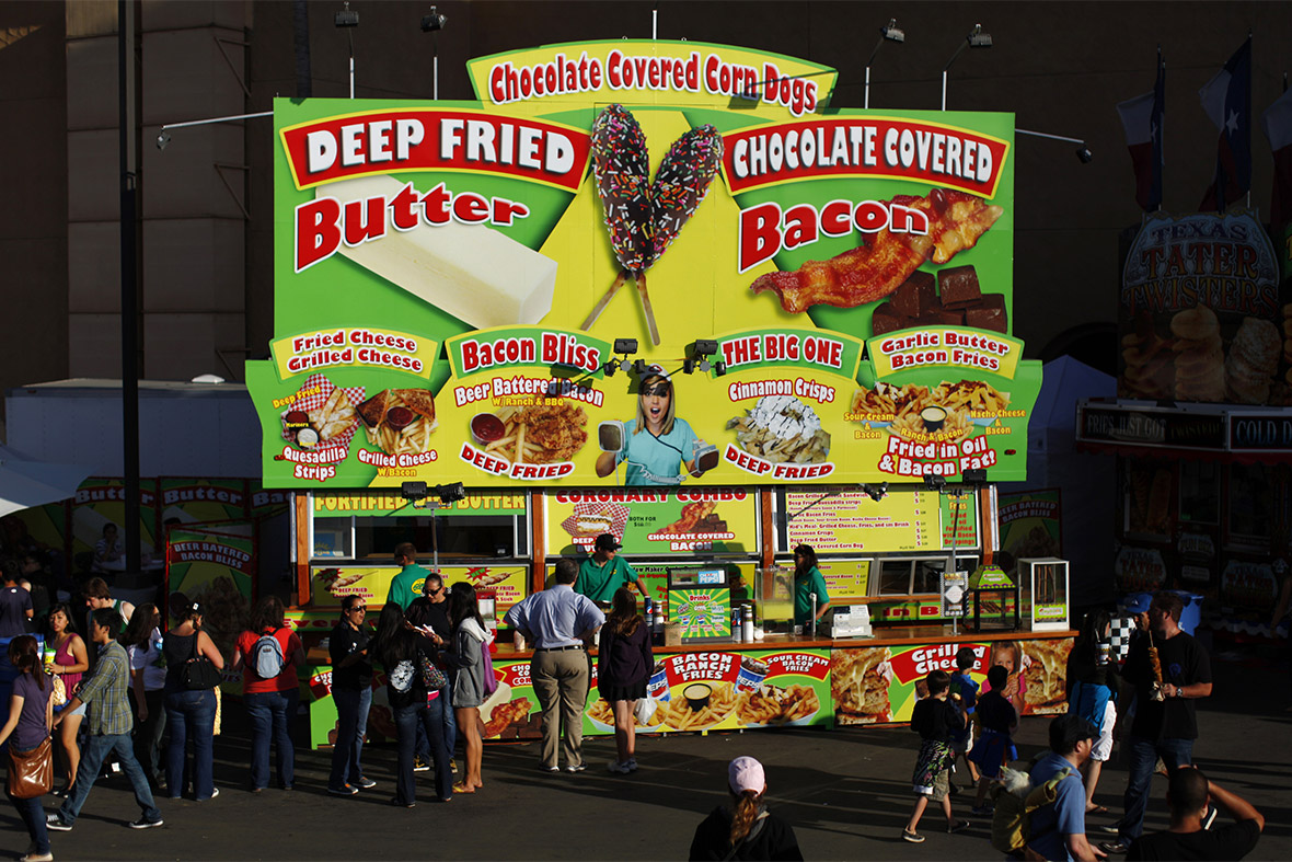 A food stand sells culinary delights such as deep fried butter and chocolate bacon at the San Diego County Fair in Del Mar, California