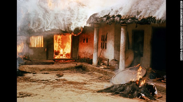 Houses in My Lai, South Vietnam, burn during the My Lai massacre on March 16, 1968. American troops came to the remote hamlet and killed hundreds of unarmed civilians. The incident, one of the darkest moments of the Vietnam War, further increased opposition to U.S. involvement in the war.