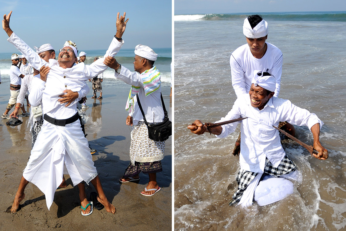 Indonesian Hindus take part in ceremonies to mark Melasti, a purification festival, at Petitenget beach in Kuta on Bali