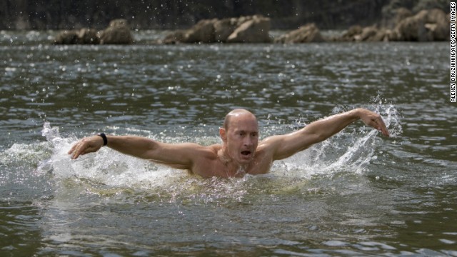 Putin swims the butterfly during his vacation outside the town of Kyzyl in southern Siberia on August 3, 2009.