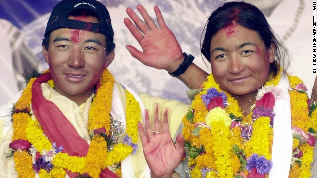 Pemba Dorje Sherpa and Moni Mulepati became the first people to get married on Everest's summit, on March 30, 2005. The couple are seen here waving from base camp on June 2, 2005. 