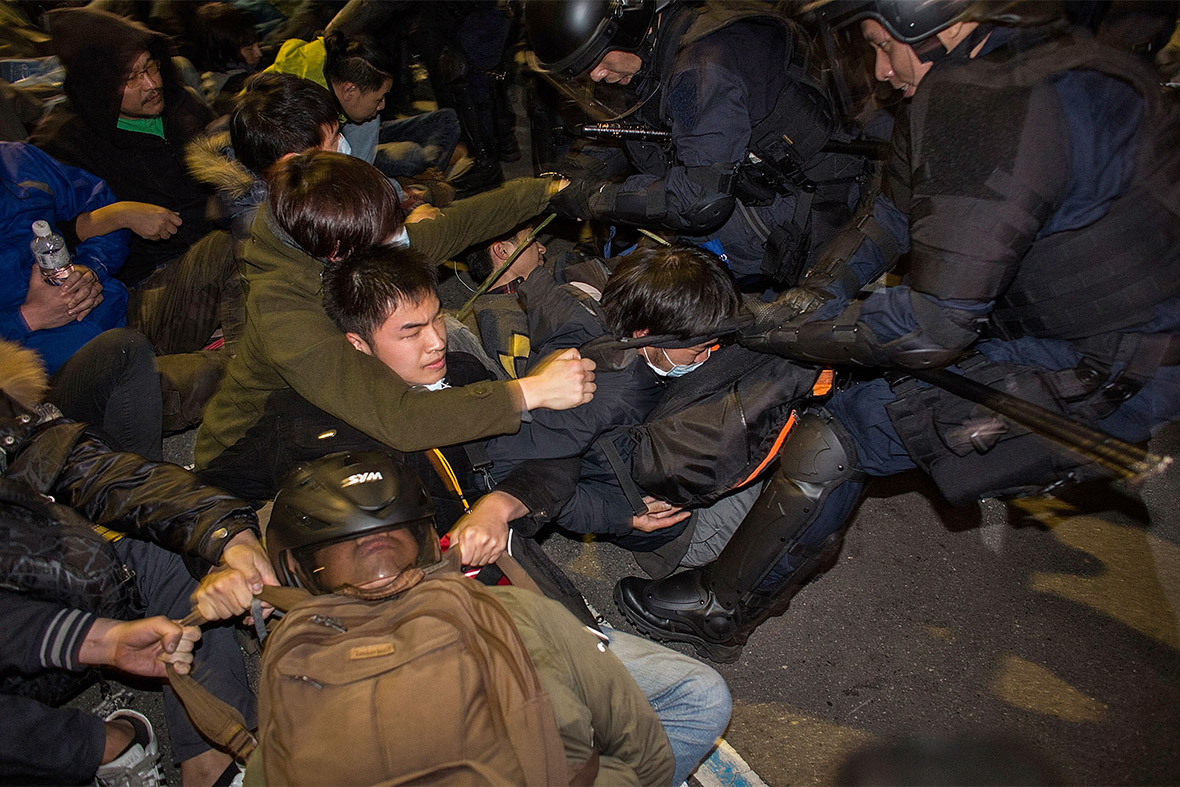 March 24, 2014: Riot police clash with student protesters outside the executive yuan