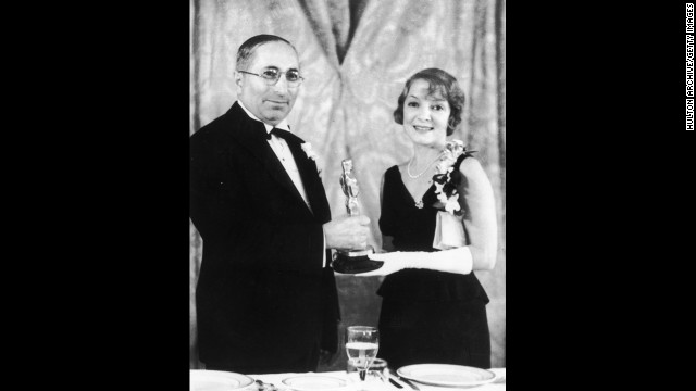 Film producer Louis B. Mayer presents the best actress Oscar to Helen Hayes for her role in "The Sin of Madelon Claudet."