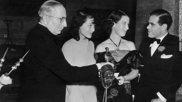 Luise Rainer, second from left, is seen at the 1937 ceremony with, from left, Louis B. Mayer, Louise Tracy and Frank Capra. Rainer won for "The Great Ziegfeld."