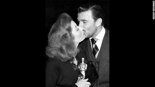 After winning the best actress Oscar in 1943, Greer Garson gets a congratulatory kiss from her "Mrs. Miniver" co-star Walter Pidgeon.