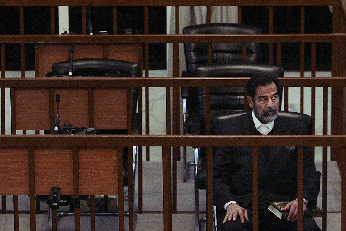 November 27, 2006: Saddam Hussein sits in court during his trial in Baghdad, Iraq