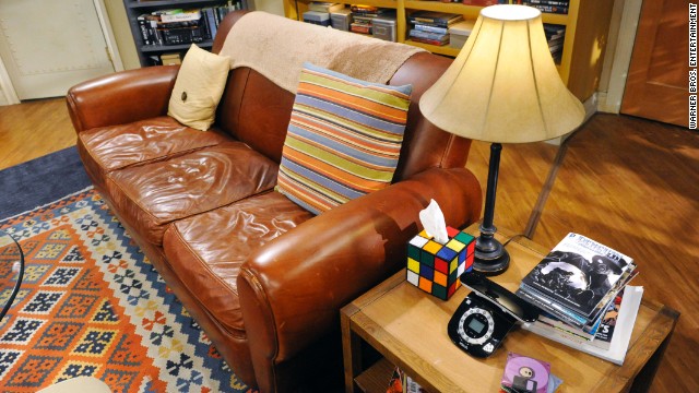 Here we have one of the most important parts of the set and one true fans will immediately recognize, "Sheldon's spot" on the couch. And that Rubik's cube tissue box? It was invented by executive producer Steve Molaro's friend Nicole Gastonguay.