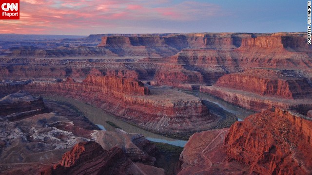 The sun slowly climbs above <a href='http://ift.tt/Qpe31O'>Dead Horse Point State Park</a> to illuminate the lively colors of the canyon.