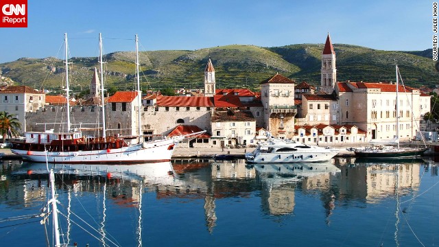Boats line the coast of Trogir. "It's not hard to understand why [Croatia has] become such a popular place to travel," said Julee Khoo. "Every place oozes quaint charm -- lots of cobblestone streets and stone buildings with terracotta tile roofs." See more photos on <a href='http://ift.tt/1hGmwUj'>CNN iReport</a>.